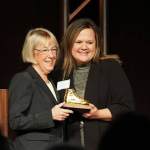 Tarra Simmons and Patty Murray with the Golden Tennis Shoe Award