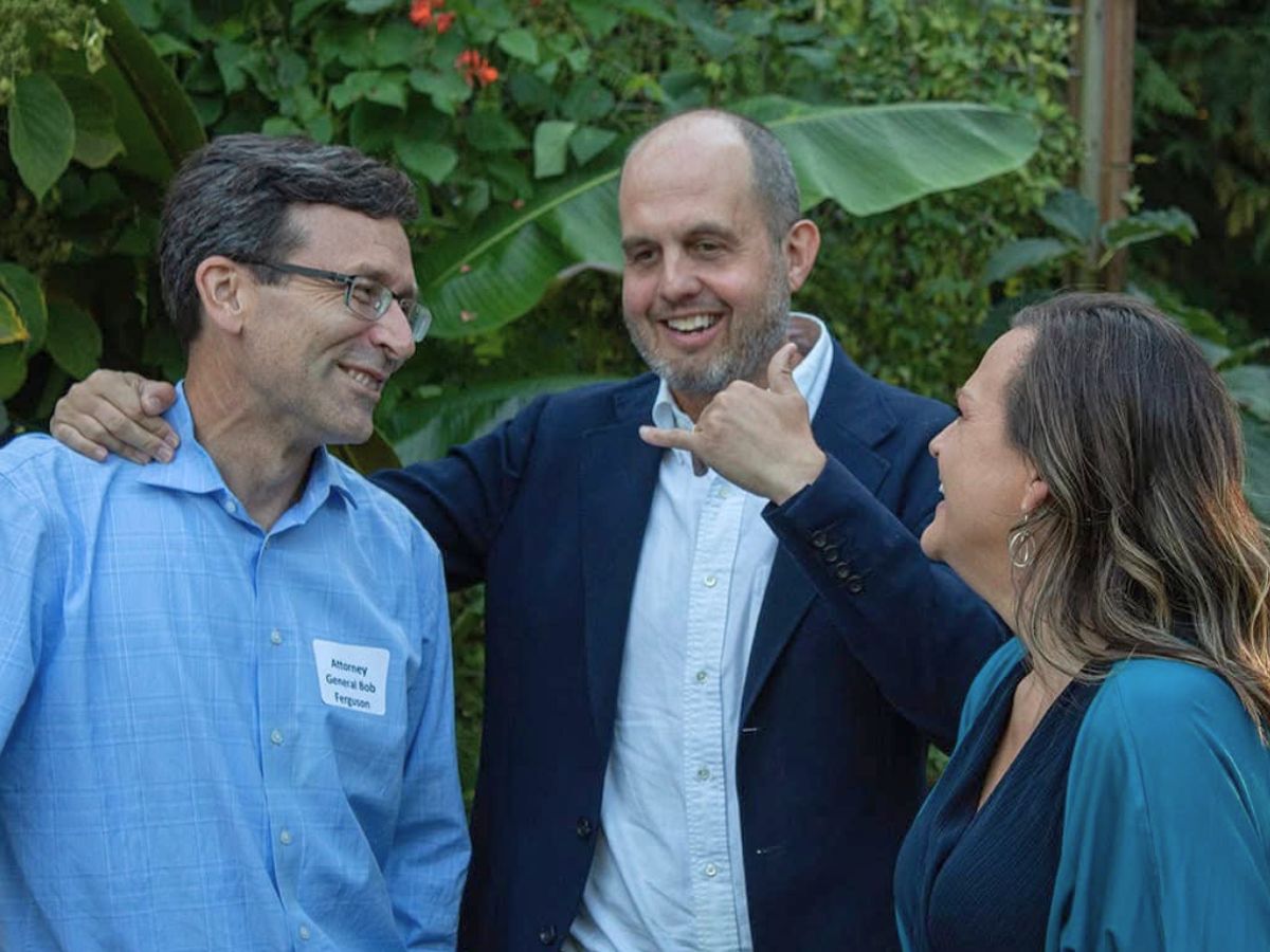 AG Ferguson, Senator Hansen, and Tarra at a Champions of Justice event